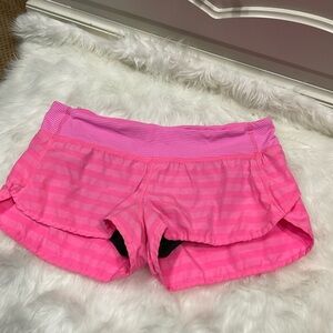 Lululemon Speed Up Shorts in a vibrant pink striped pattern